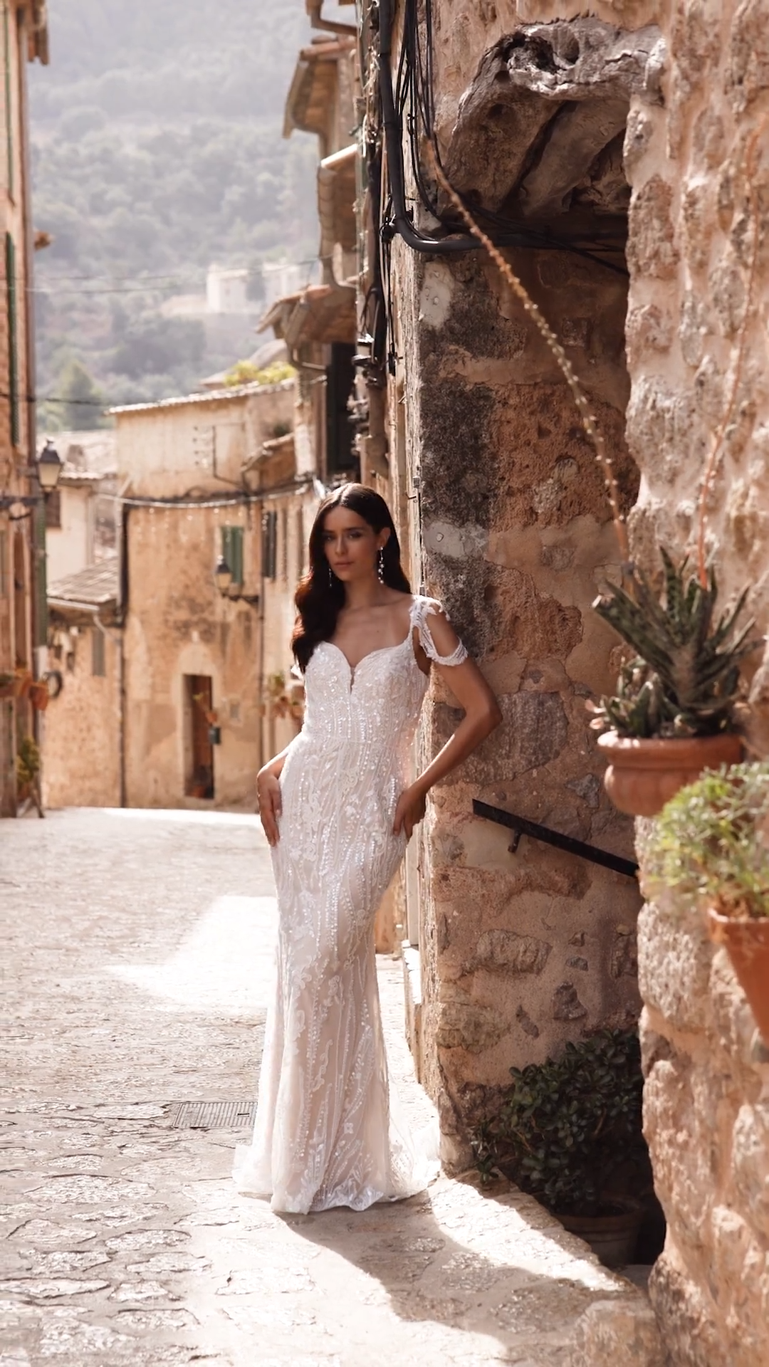 Bohemian beaded column wedding dress with off the shoulder sleeves and thing waist sash