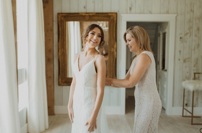 Guide to Wedding Dress Alterations: How to Prepare, Budget & More