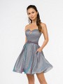 Style 3682RK strapless sweetheart with cutout mini A-line dress with beaded belt in purple iridescent jersey Style 3682RK strapless sweetheart with cutout mini A-line dress with beaded belt in purple iridescent jersey