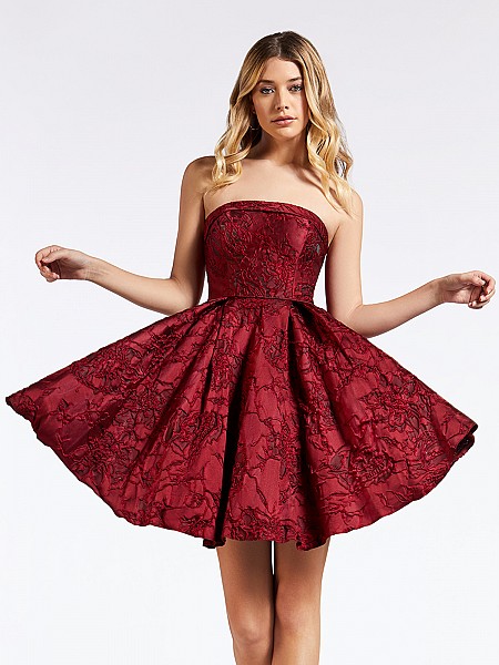 Strapless jacquard homecoming wine dress with box pleats and folded strapless neckline
