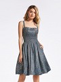 Short A-line blue metallic print jersey dress with box pleats and pockets at side skirt