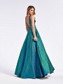 Green full A-line prom gown with  illusion inset at sides and pockets at side skirt