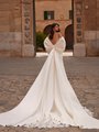 Satin wedding dress with bow shrug and cathedral satin and lace train