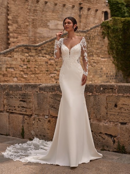 Long illusion sleeve crepe wedding dress with sexy bodice cutouts and sweetheart neckline