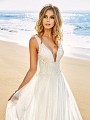 Simply Val Stefani S2081 ethereal bohemian lace A-line wedding dress with sexy low neckline and flowing skirt Simply Val Stefani S2081 ethereal bohemian lace A-line wedding dress with sexy low neckline and flowing skirt