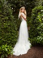 Style EVEREST tulle and lace A-line gown with illusion v-back, thin straps and eye-catching tulle bow at shoulder Style EVEREST tulle and lace A-line gown with illusion v-back, thin straps and eye-catching tulle bow at shoulder