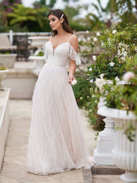 Style SUNSET plunging sweetheart with beaded straps A-line boho bridal gown in beaded appliques over embroidered lace fabric Style SUNSET plunging sweetheart with beaded straps A-line boho bridal gown in beaded appliques over embroidered lace fabric