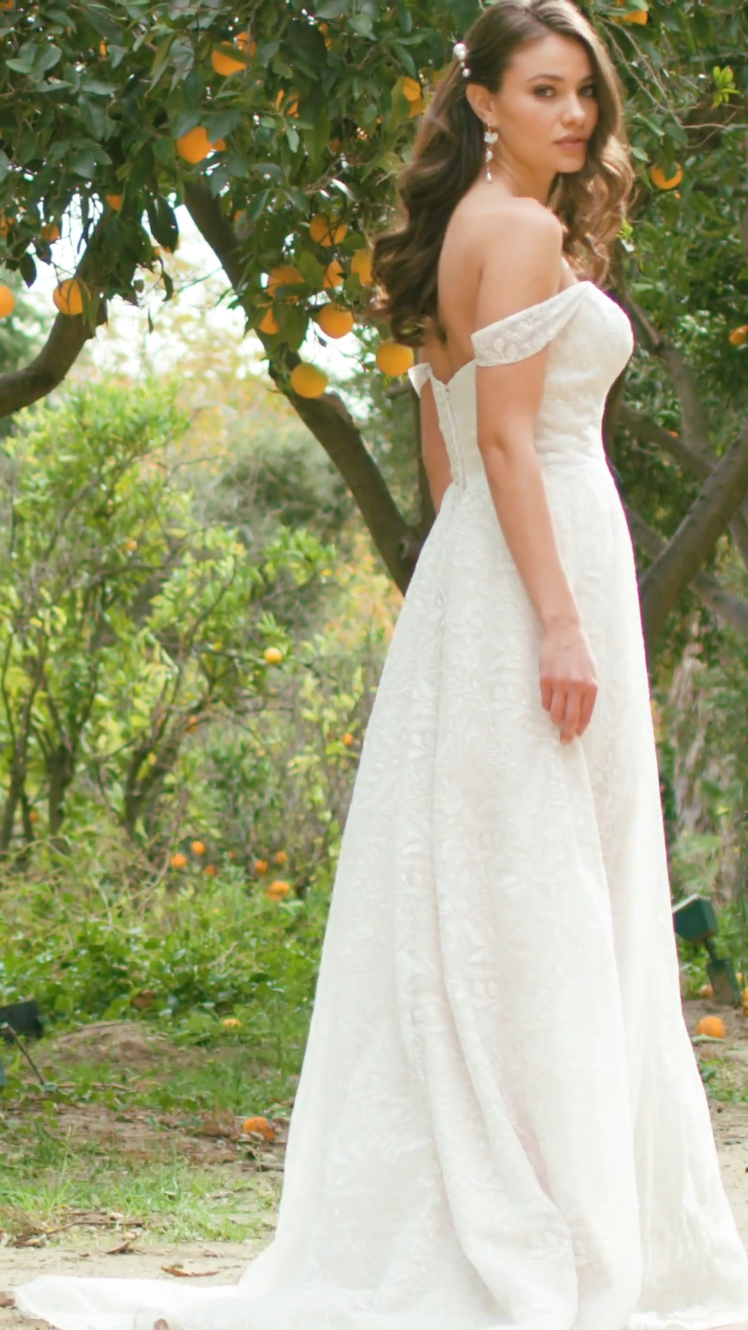 Simply Val Stefani S2198 Shimmery Embroidered Floral Lace Full A-Line Wedding Dress With Sheer Swag Sleeves And Pockets
