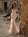 Bohemian lace mermaid wedding dress with plunging sweetheart neckline and off the shoulder sleeves